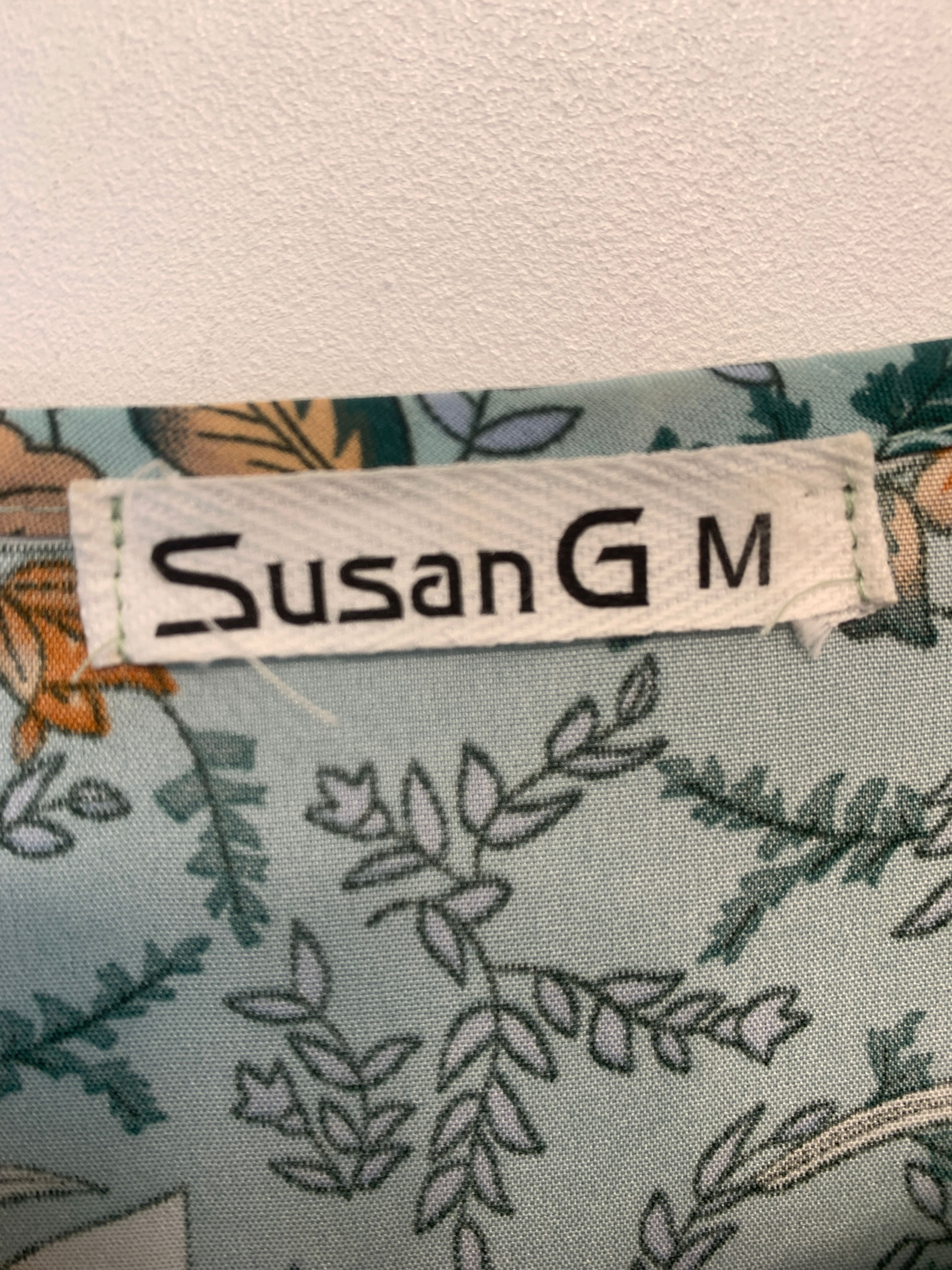 Susan G Tunika